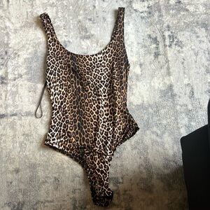 Cheetah print bodysuit size large new w tags